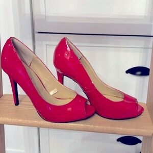 Guess cherry red, peep toe stilleto pumps. Gorgeous shoes! Size 7